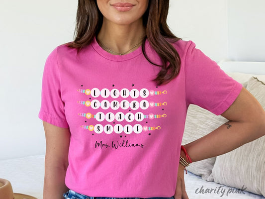 Lights Camera Teach Smile Personalized Teacher Shirt, Groovy Teacher Shirt, Teacher Friendship Bracelet Shirt Bella Canvas Shirts